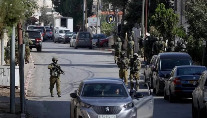 1 de 1 imagem colorida exercito israel rua cisjordania - Foto: Issam Rimawi/Anadolu via Getty Images